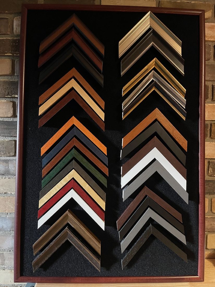 Wood and metal frame corner samples on the framing wall